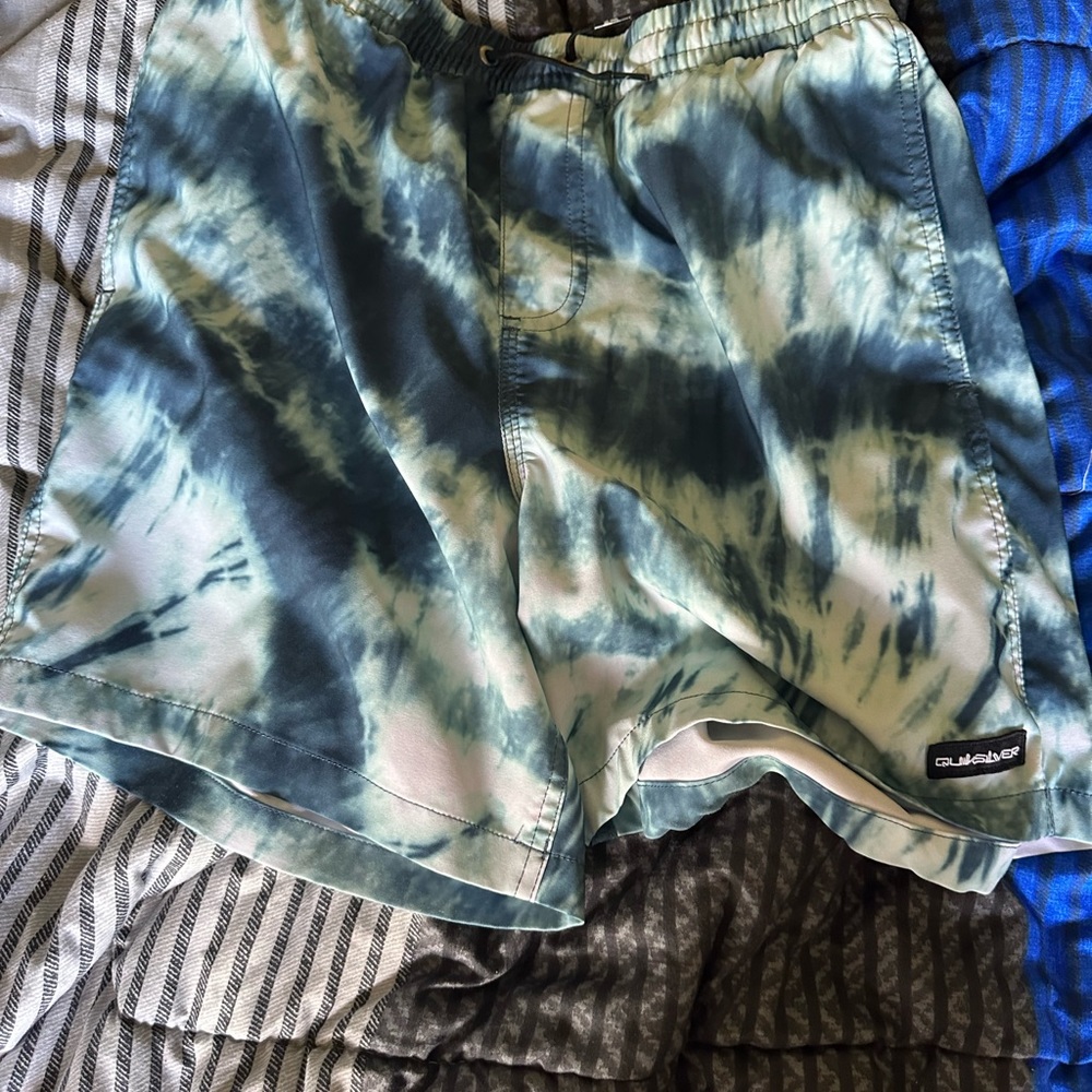 Blue shorts.